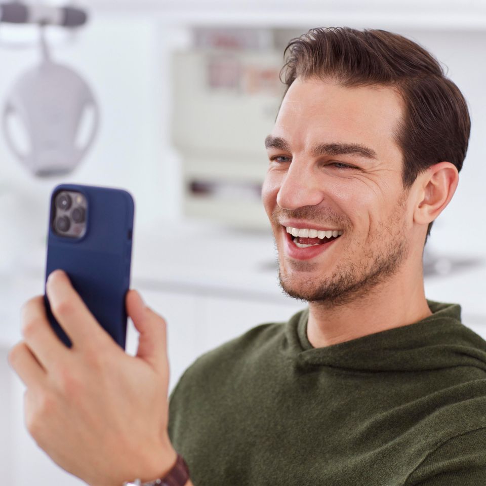 Dental professional adjusting a Zoom! WhiteSpeed lamp