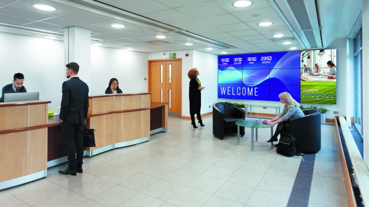 Interactive digital signage - touch  technology | People waiting at a reception desk